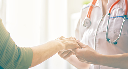 Doctor Holding Patient Hand