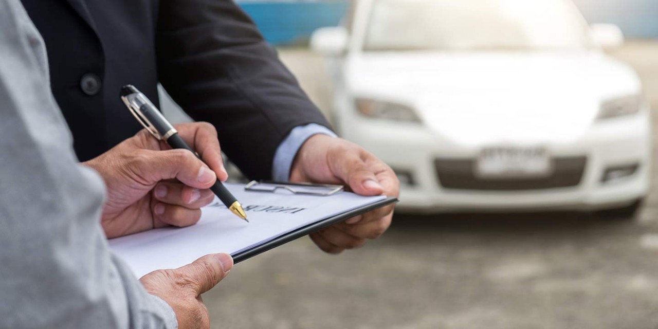 Insurance agent signing the claim form