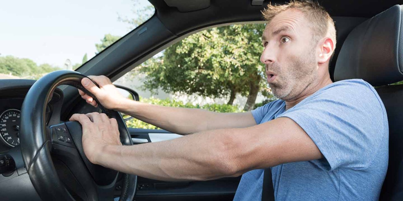 shocked guy in car
