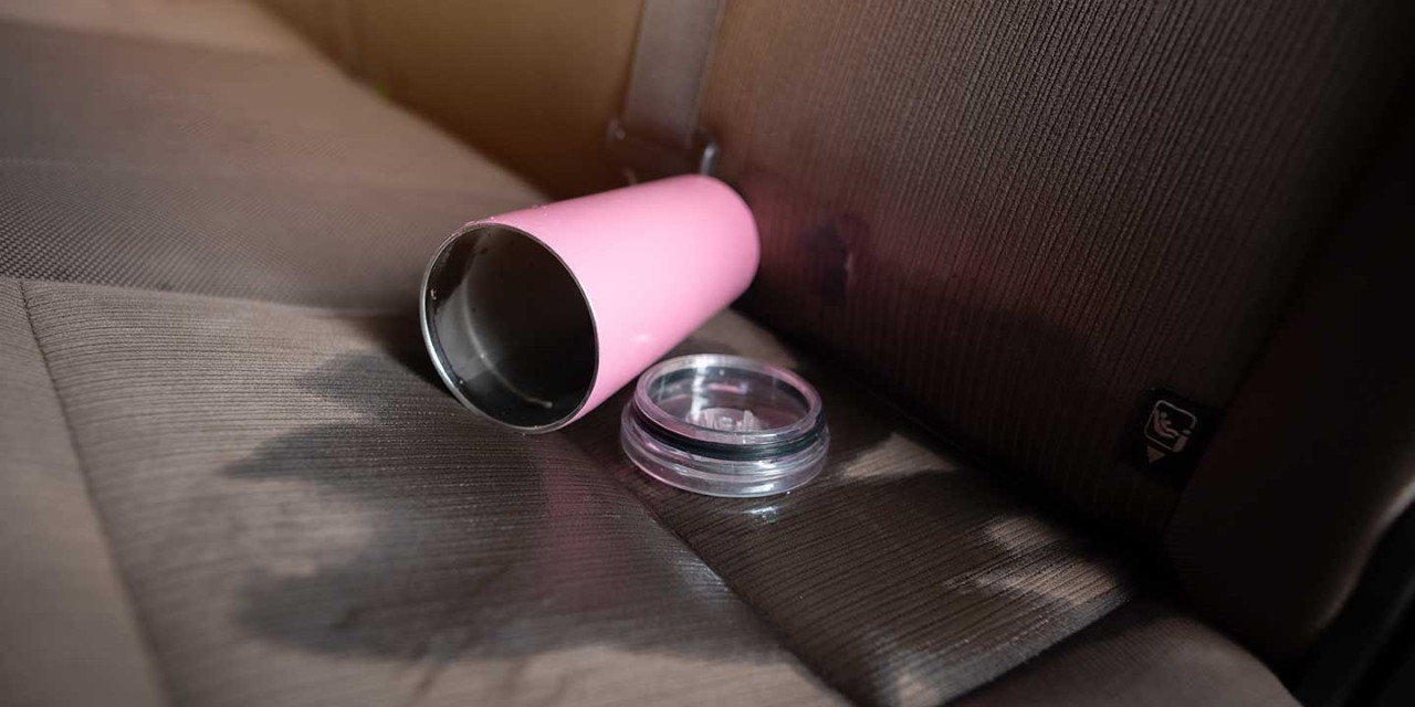Glass of water spilled on the car backseats