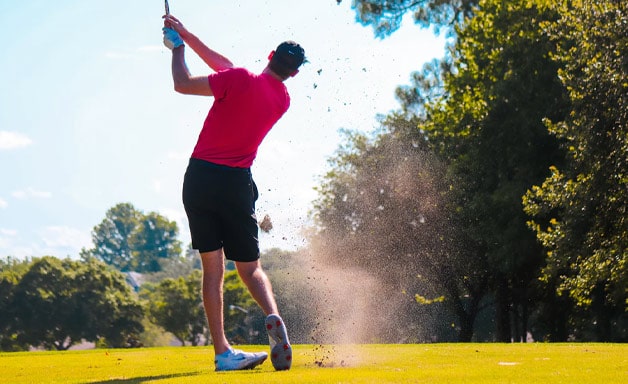 Golfer swinging