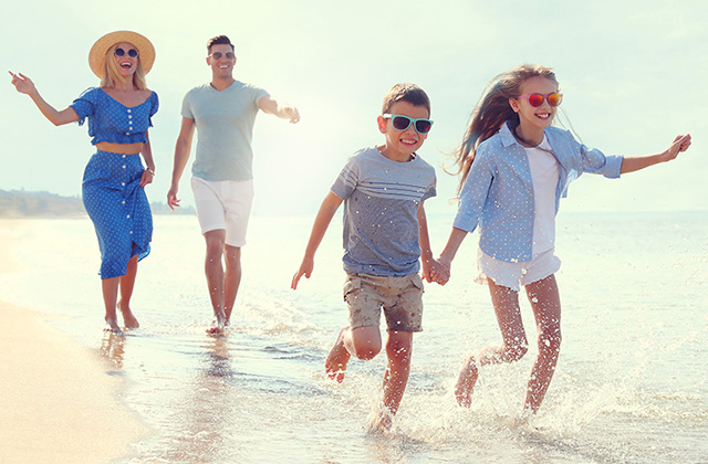 family holiday on the beach