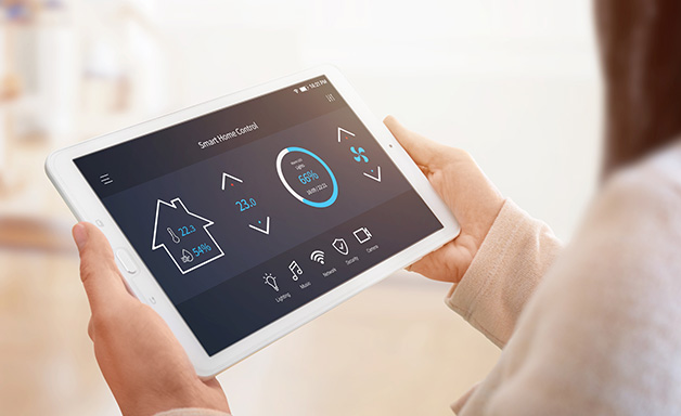 All in one smart home control system app concept on tablet display in woman hands