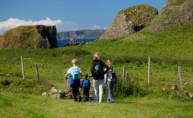 mother showing mountain to children